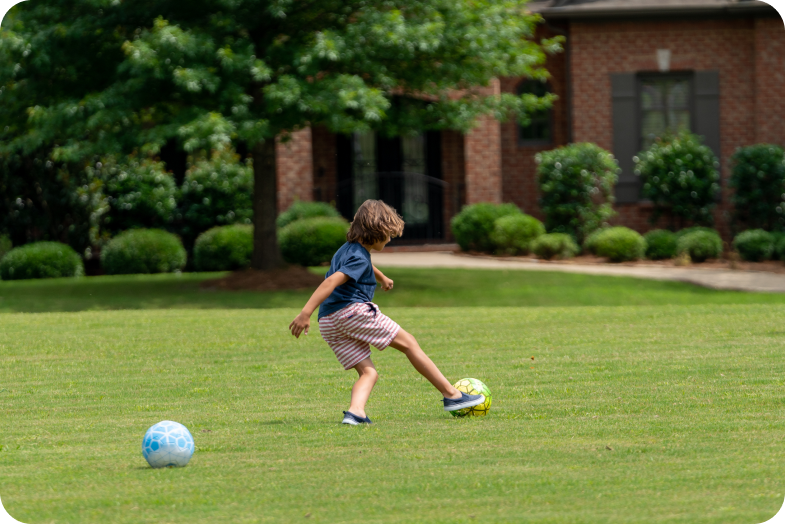 Child playing soccer